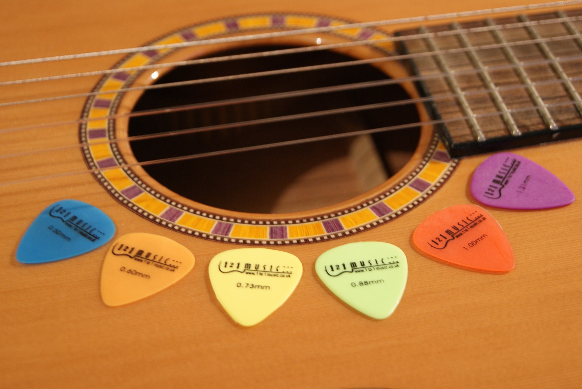 NEW GUITAR PICK FROM CARLOS SANTANA THIS IS THE COLORED PICK HE USES ONSTAGE !